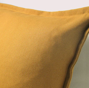 Mustard yellow cotton throw pillow